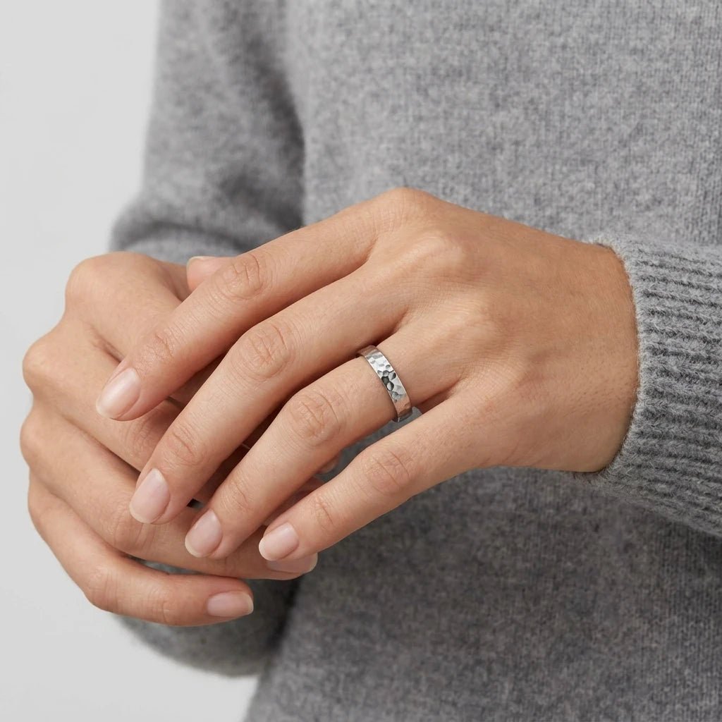 Enhanced 4mm hammered stainless steel wedding band, angled view