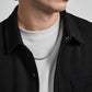 Unisex 5mm Cuban link chain made of durable stainless steel, shown on a white background  