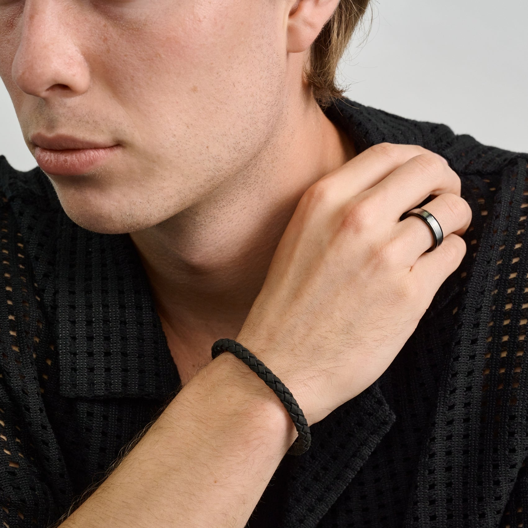 Premium black Italian braided leather bracelet paired with a sleek black stainless steel closure  