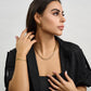 Silver-tone Figaro link chain necklace featuring distinctive pattern and sturdy construction  