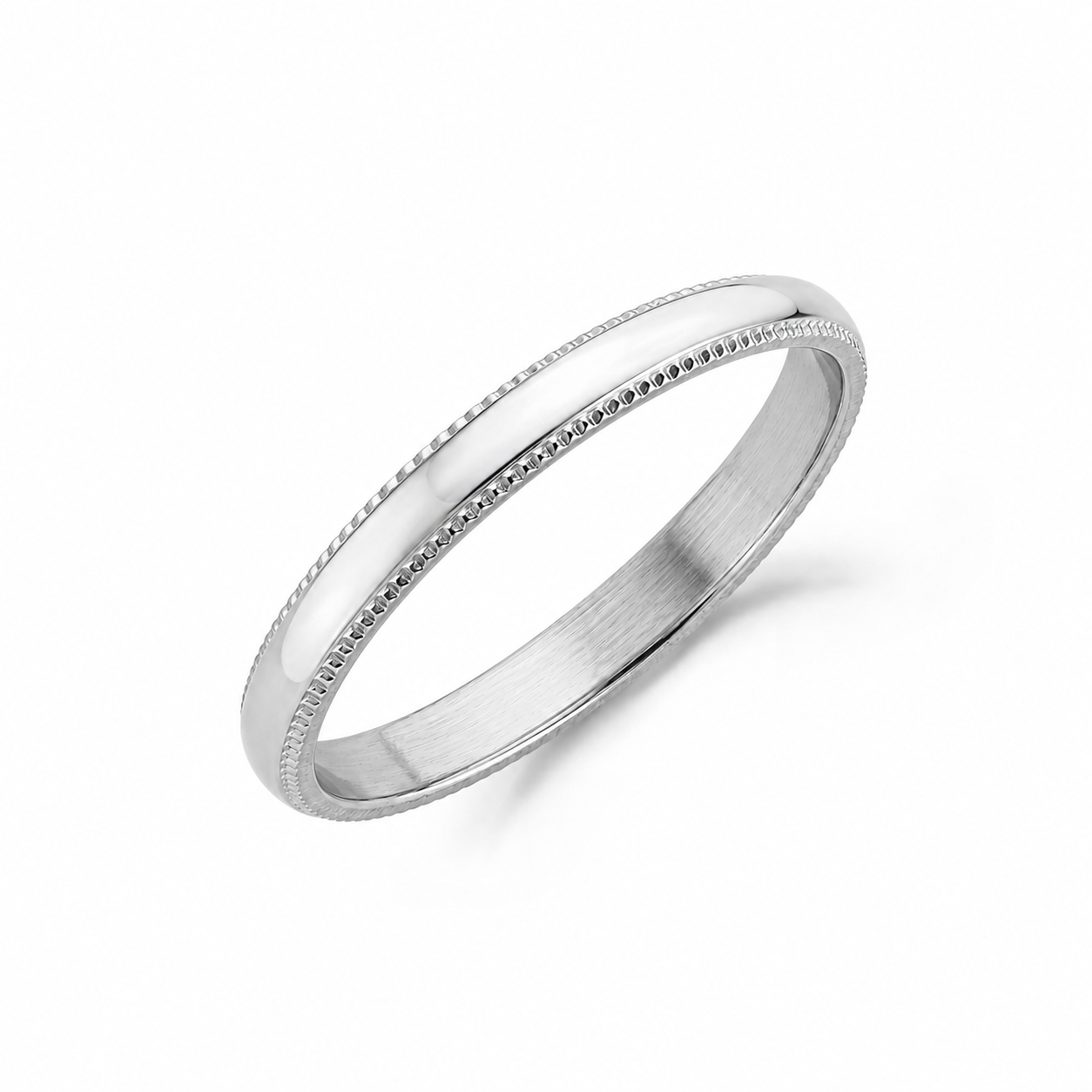 Close-up of a polished 3mm stainless steel domed wedding band with intricate milgrain detailing on edges  