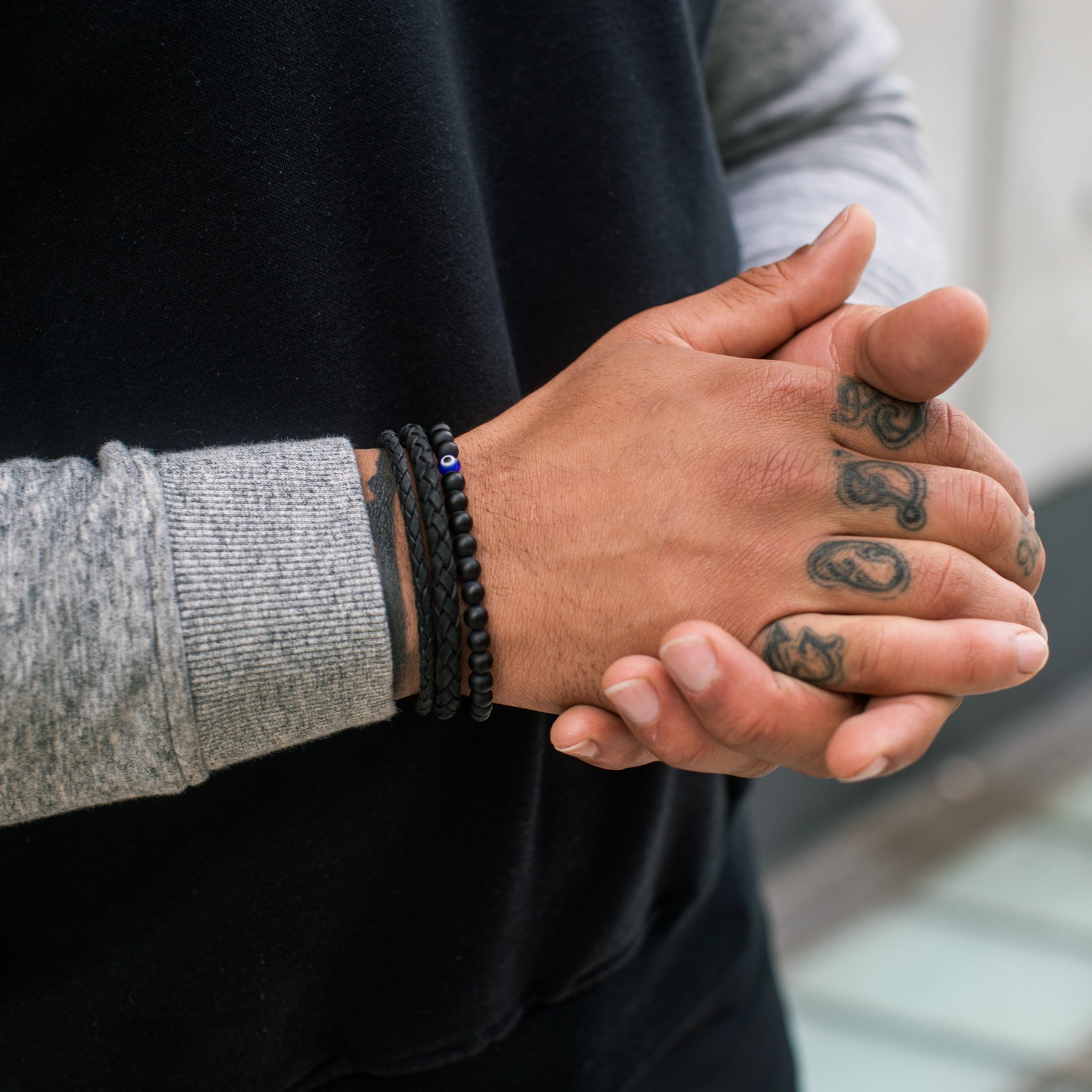 Durable black leather and stainless steel bracelet designed for comfort and lasting wear  