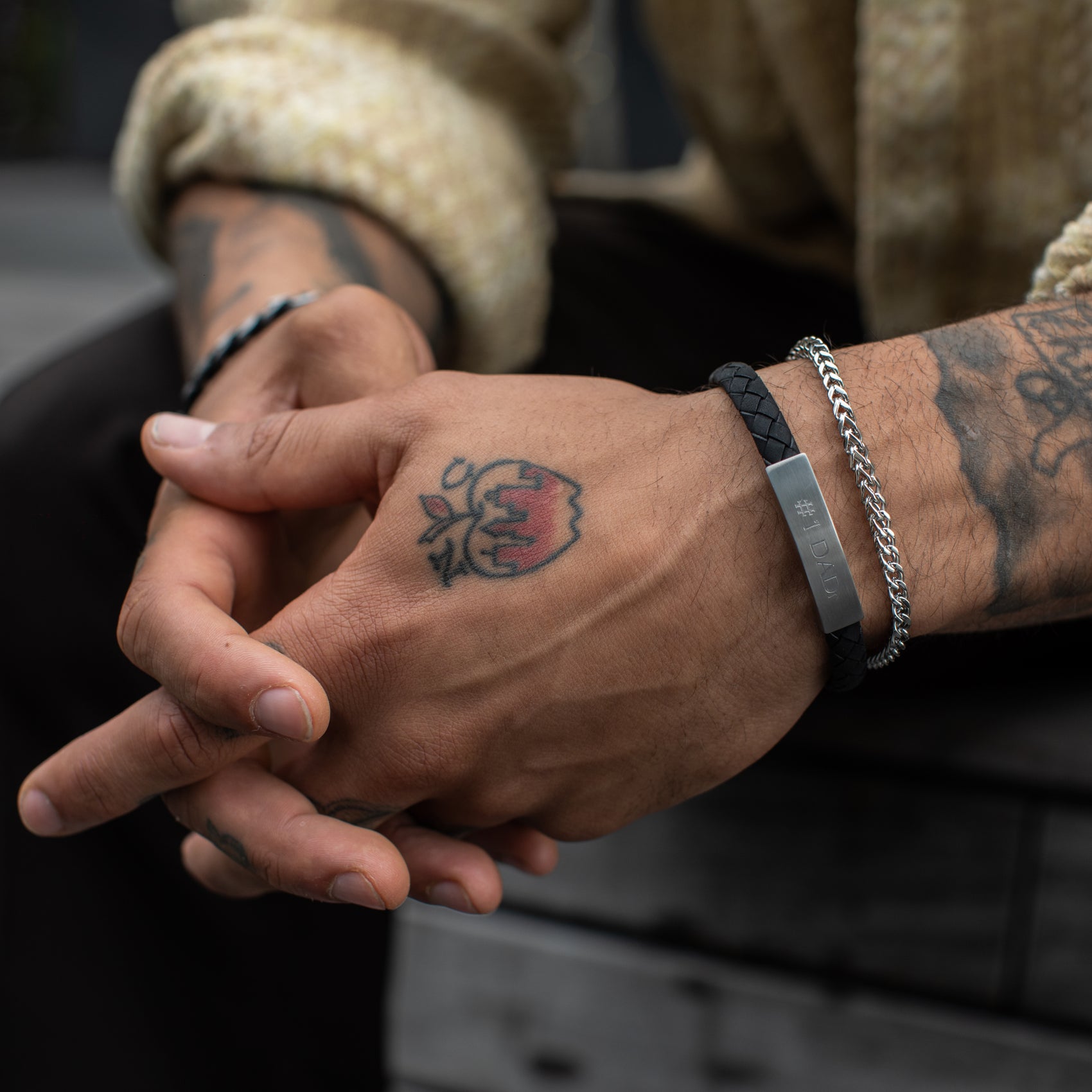 Side view of a durable stainless steel Franco link bracelet with a refined design  