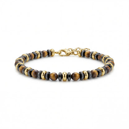 Close-up of Sovereign Tiger Eye men's bracelet with 4mm tiger eye beads, black and gold stainless steel accents, laid flat showing adjustable clasp.