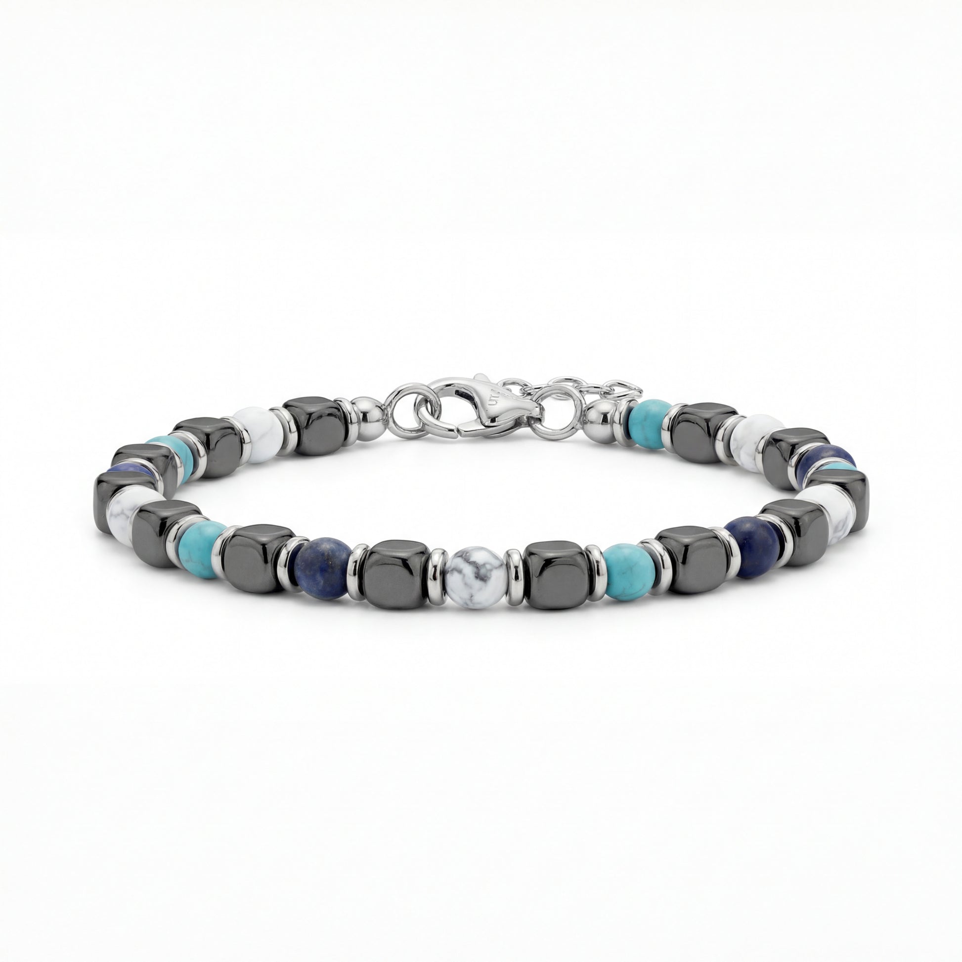 Close-up of Glacier Stone Bracelet featuring 5mm white turquoise, sodalite, and hematite beads with stainless steel spacers and an adjustable clasp on a white background.