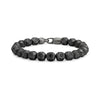 Matte black soccer bead bracelet with black cubic zirconia stones and gunmetal clasp shown on white background