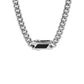 Close-up of stainless steel clasp with carbon fiber inlay and black cubic zirconia details on men’s chain