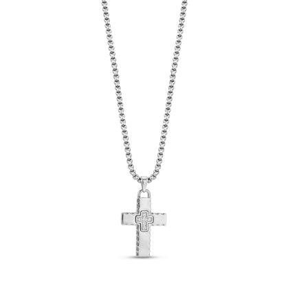 Close-up of a stainless steel men's cross pendant with detailed textured edges on an adjustable chain