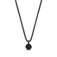 Close-up back view of the matte black hexagon pendant showing the engravable plain back surface and chain