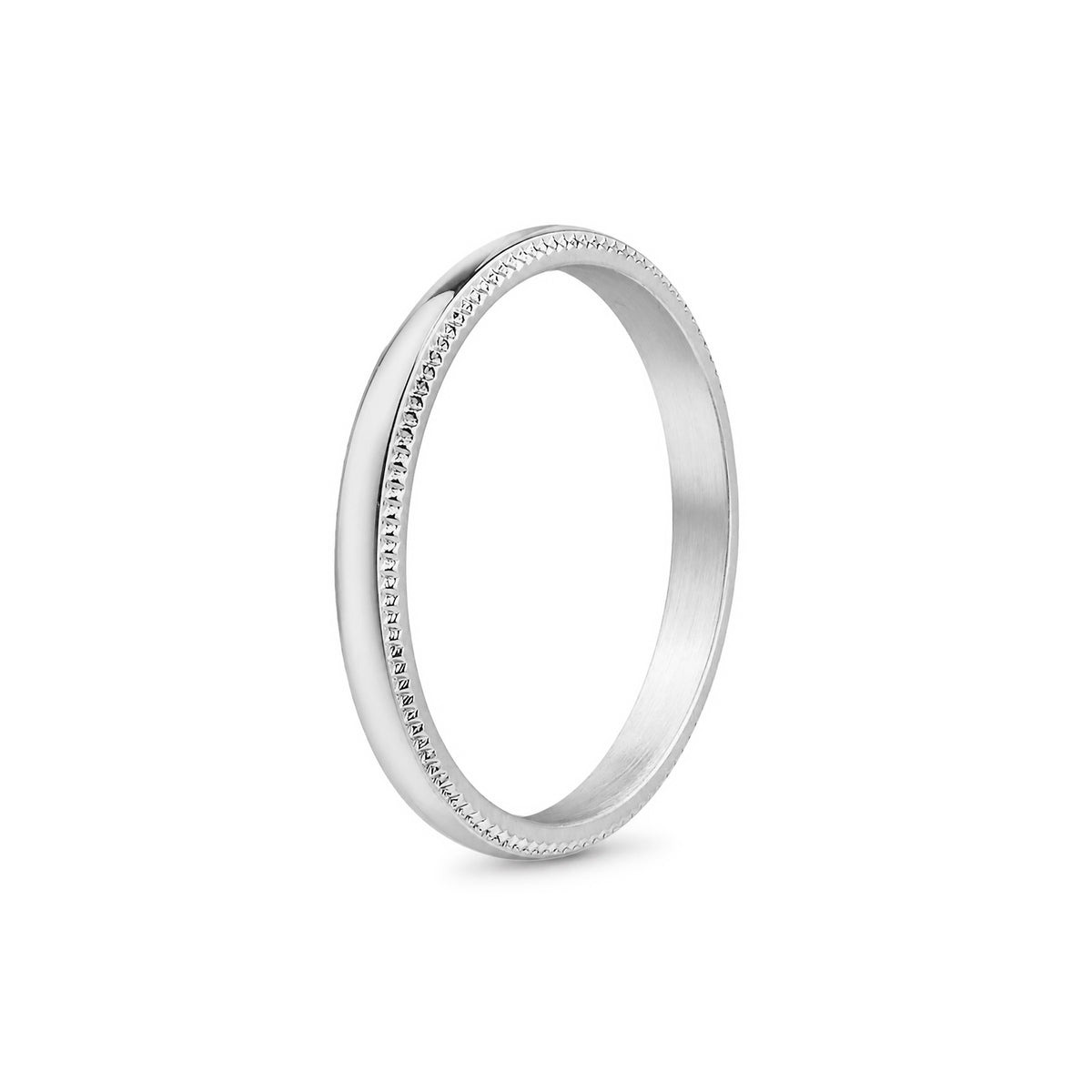Side profile of a silver stainless steel milgrain wedding band standing upright showing the domed comfort fit interior.
