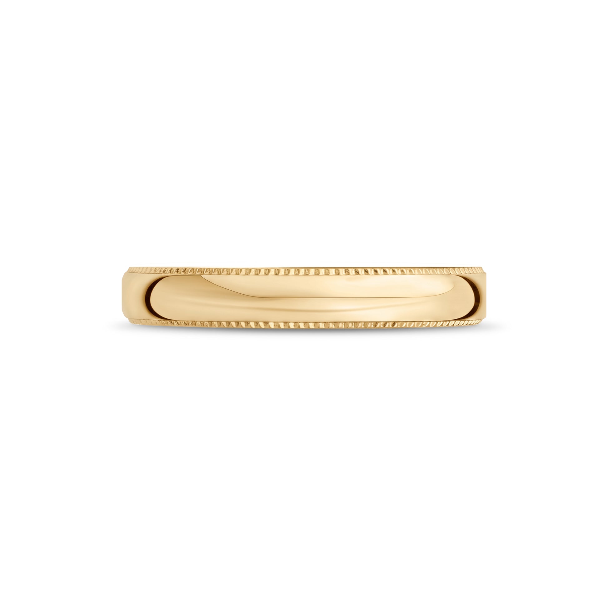 Ring on a clean surface showcasing the engravable interior of a durable stainless steel milgrain wedding band  