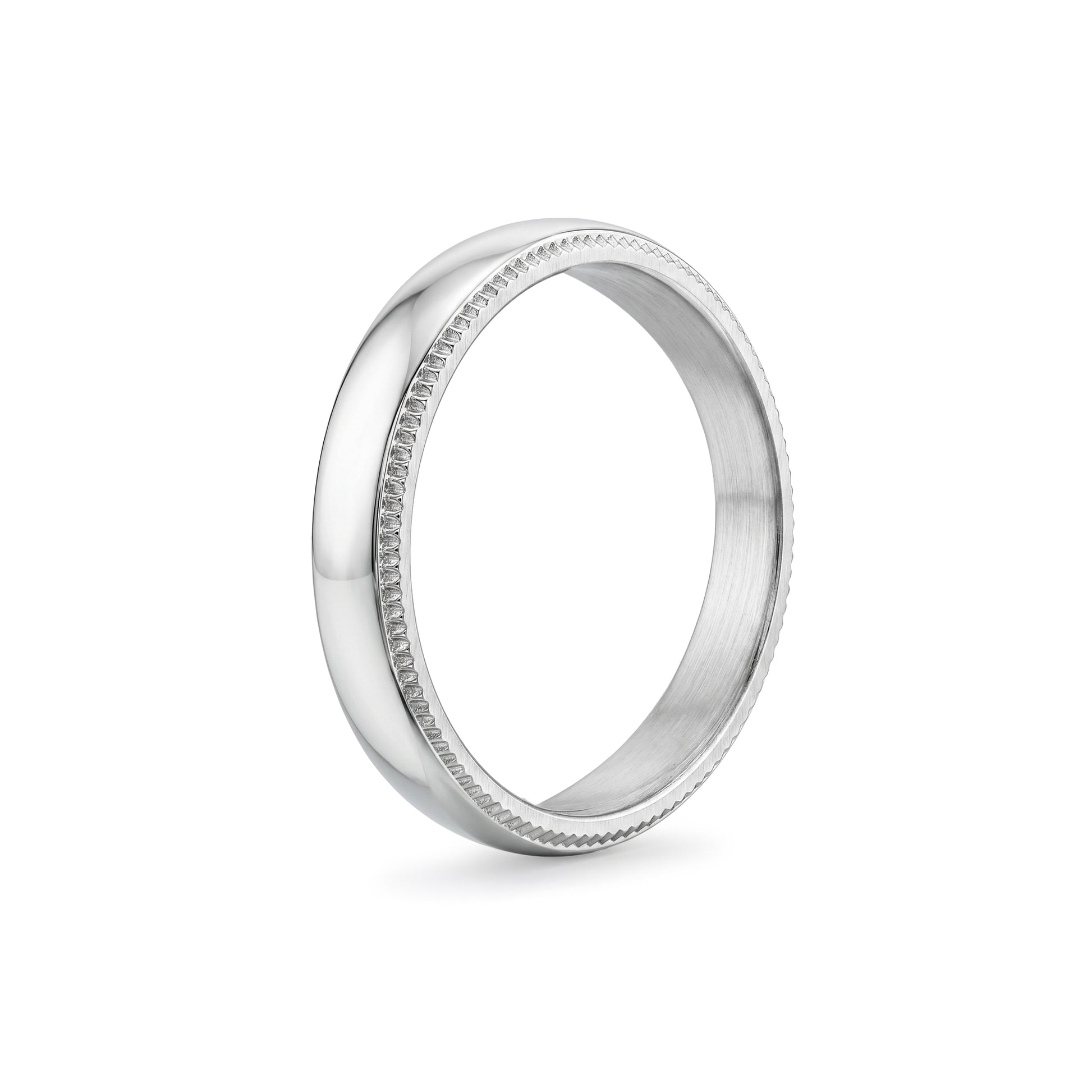 Side view of stainless steel domed wedding band highlighting smooth, polished finish and milgrain trim  