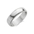 Close-up of a polished 6mm stainless steel wedding band with milgrain edges and a domed profile  