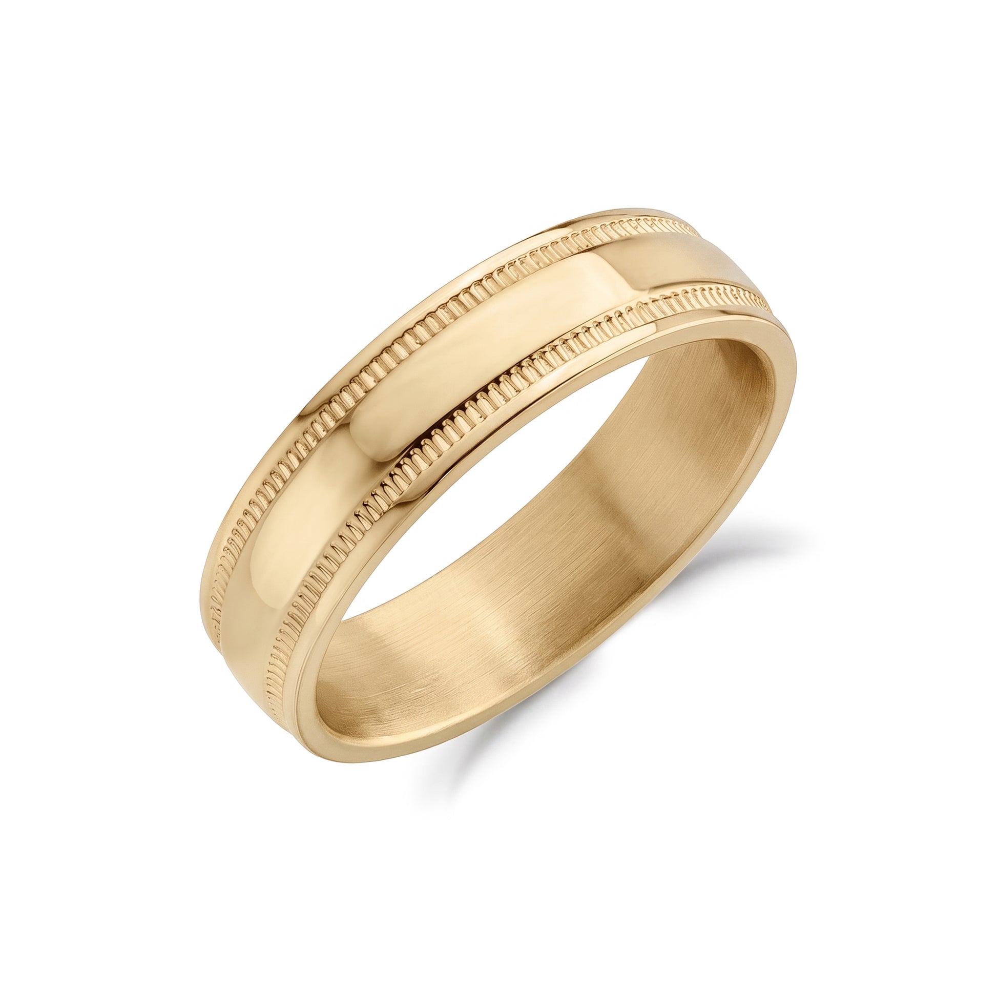 Stainless steel ring resting on a dark surface highlighting the hammered texture.  