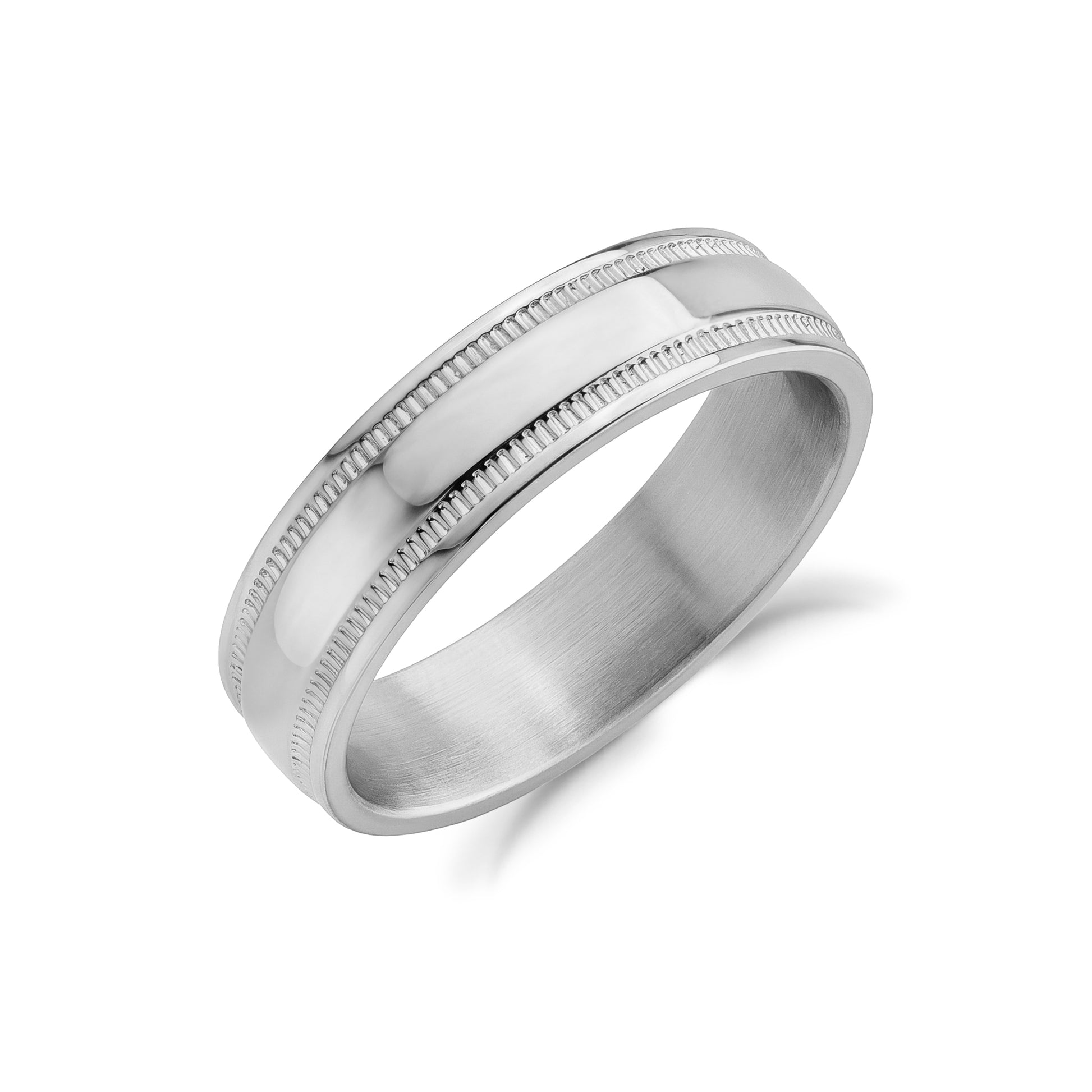 Close-up of a 6mm stainless steel wedding ring with milgrain detailing and polished finish.  