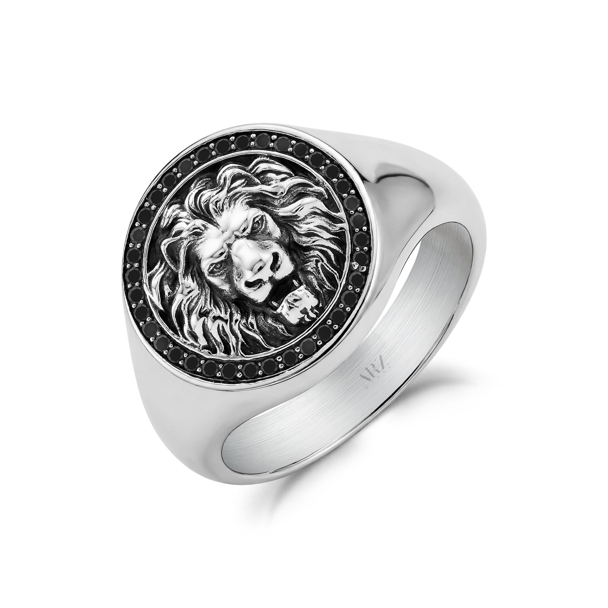 A silver-toned signet ring featuring an embossed lion head in relief, surrounded by a border of small black stones, shown on a clean white background.