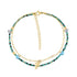 Dauphin gold anklet featuring turquoise and black glass beads on a gold stainless steel chain with a dauphin charm and adjustable clasp.