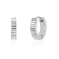 Close-up of rippled stainless steel huggie earrings with a smooth, modern finish  