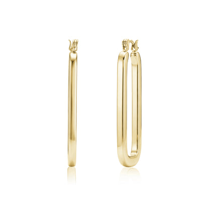 Gold elongated oval hoop earrings displayed from side and front views