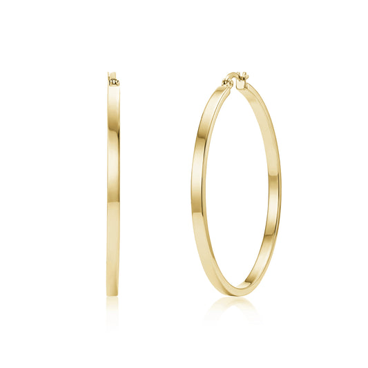 Gold flat oval hoop earrings with 50mm diameter and 3mm width, polished stainless steel finish