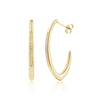 Gold-tone modern pave curve hoop earrings with cubic zirconia stones