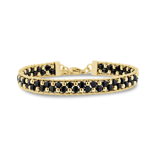Woven bead link bracelet made of gold-tone stainless steel and black spinel beads with a lobster clasp