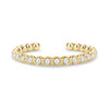 Gold-tone pearl open cuff bracelet with shell pearls set in stainless steel