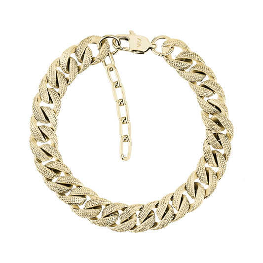 Close-up of gold textured Cuban link bracelet with lobster clasp and extension chain