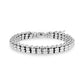 Polished silver tone block link bracelet with lobster clasp closure, 7mm wide, displayed on white background