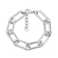 Close-up front view of bold elongated link bracelet in polished silver stainless steel with lobster clasp and extender chain