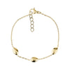 Women's stainless steel bracelet with three polished oval dome links and adjustable chain in gold tone