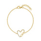 Gold women's bracelet featuring open heart shape with sparkling stones and 'love' word detail on an adjustable chain