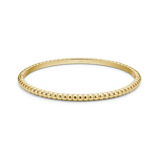Gold tone women's bubble edge bangle bracelet featuring rounded bubble edge design on white background