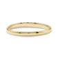 Side view of gold stainless steel classic croissant bangle showing smooth inner surface and textured outer edge