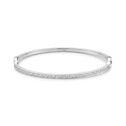 Silver stainless steel bangle bracelet with pavé-set cubic zirconia stones on front profile