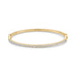 Gold-tone stainless steel bangle bracelet with pavé-set cubic zirconia stones front view