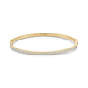 Gold-tone stainless steel bangle bracelet with pavé-set cubic zirconia stones front view
