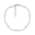 Silver tone infinity station tennis bracelet with matte infinity symbols and clear cubic zirconia stones on a white background