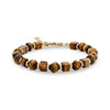 Geometric brown tiger eye stone bead bracelet with gold stainless steel accents and lobster clasp on a white background