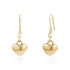 Gold dangling heart earrings made from polished stainless steel with smooth, reflective heart pendants