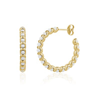 Gold pearl hoop earrings featuring shell pearls set in a wave design with 30mm diameter and 4mm width