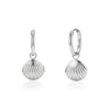 Silver stainless steel hoop earrings with dangling seashell charm