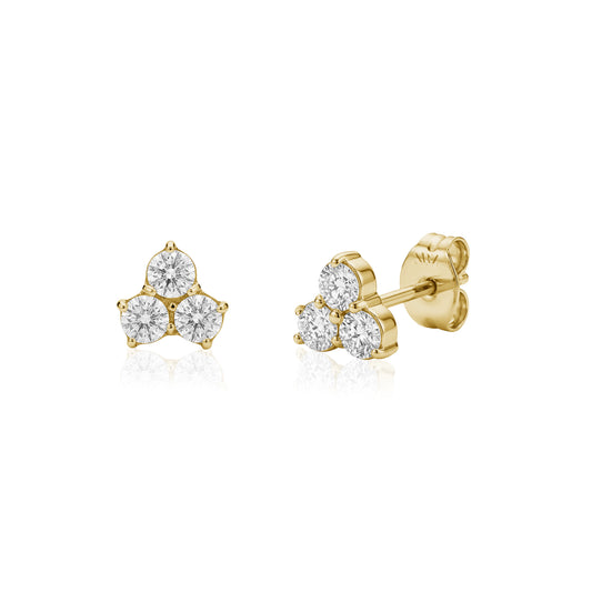 Gold stainless steel lotus flower stud earrings with three 2mm stones on white background