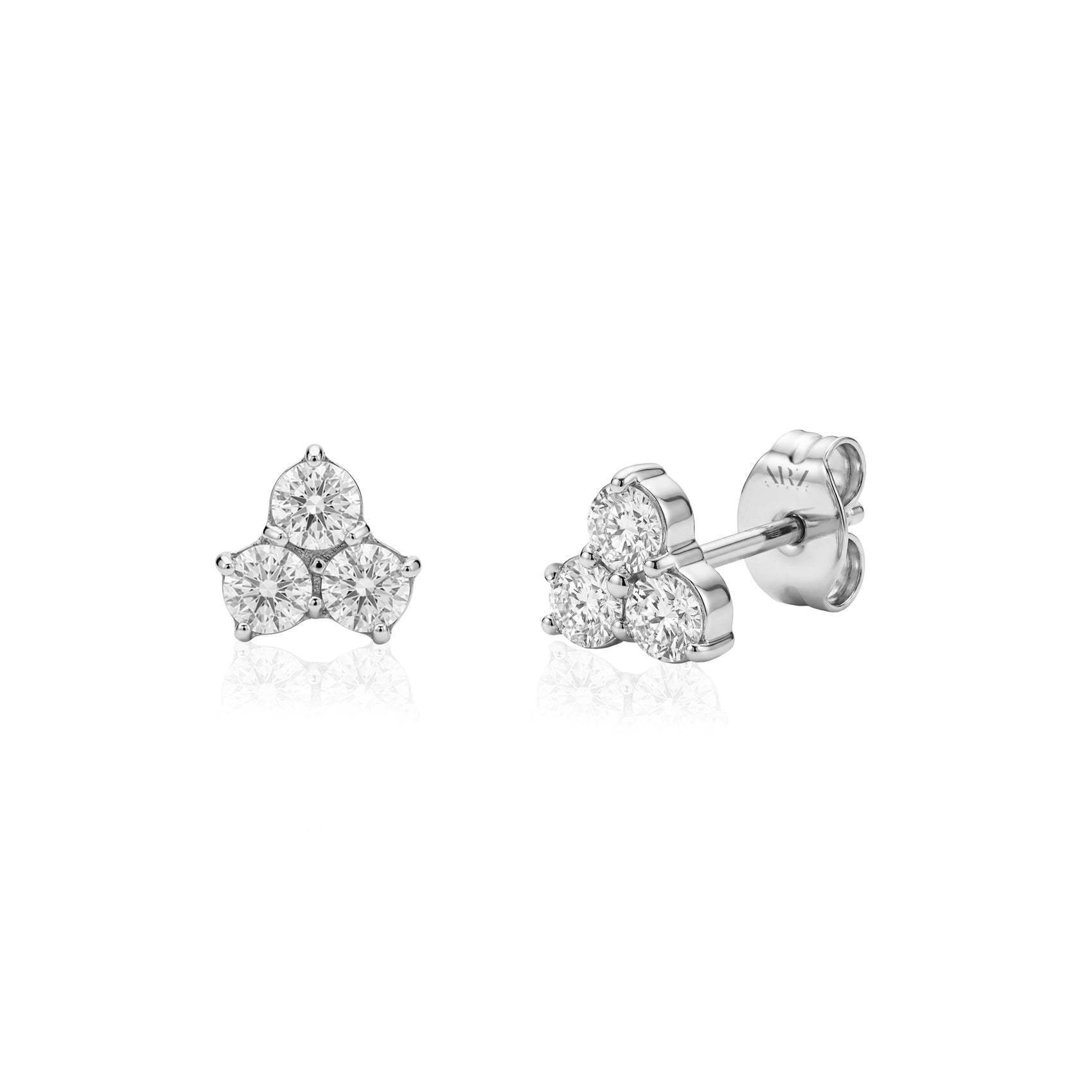 Silver stainless steel lotus flower stud earrings with three 2mm stones on white background