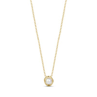 Gold sculpted bezel pearl necklace with 16 inch chain and white shell pearl pendant