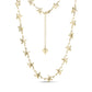 Gold stainless steel starfish link necklace with heart charm extension on white background