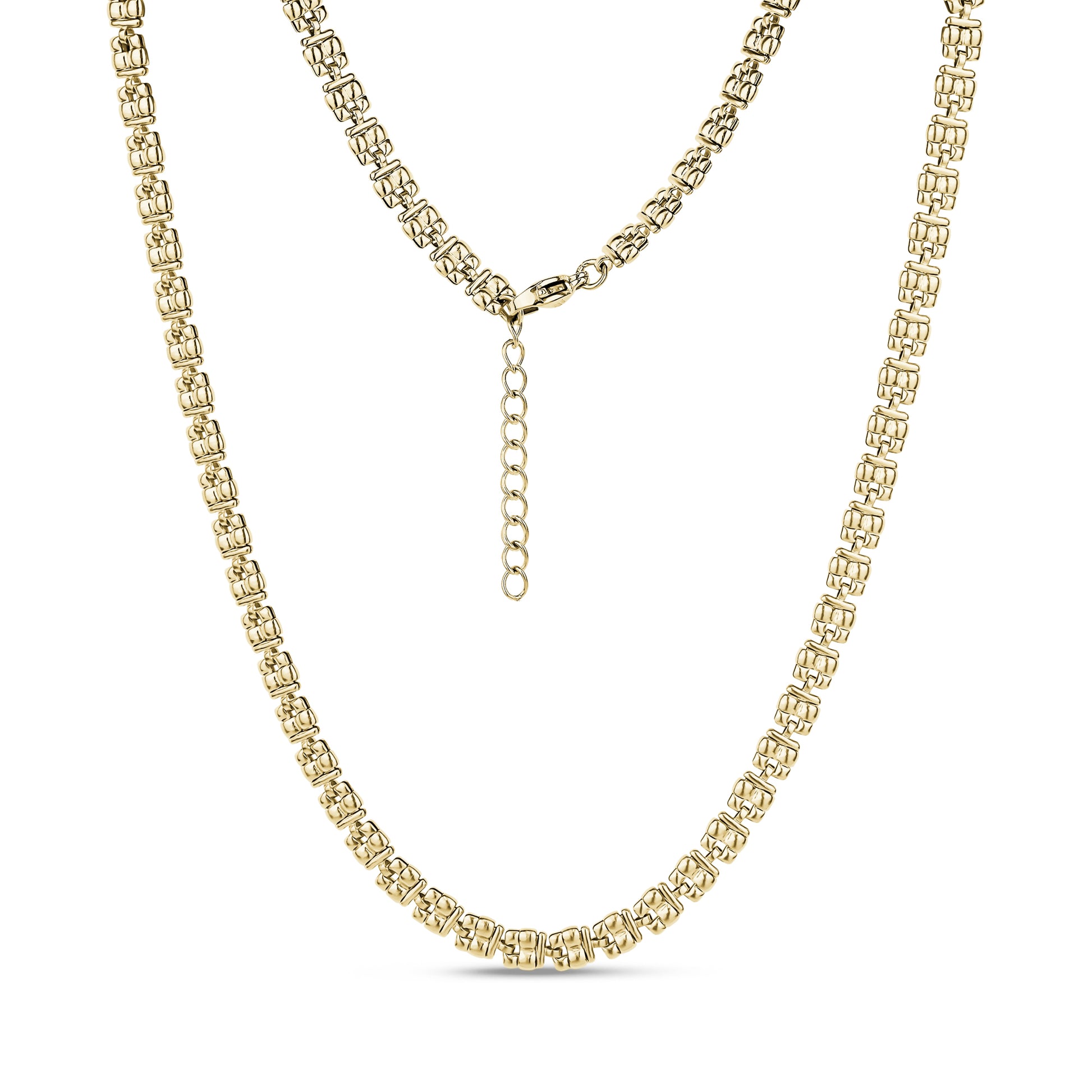 Gold sculpted link necklace with lobster clasp and adjustable extension chain on white background