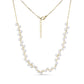Gold-tone floating pearl chain necklace with 4mm shell pearls on a delicate stainless steel chain, featuring a lobster clasp and adjustable extension.