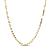 Gold refined flat twist necklace shown close-up highlighting polished stainless steel twist links