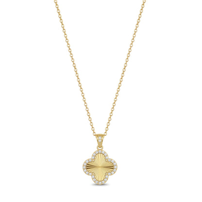 Gold stainless steel four-leaf clover pendant necklace fully set with cubic zirconia stones, front view